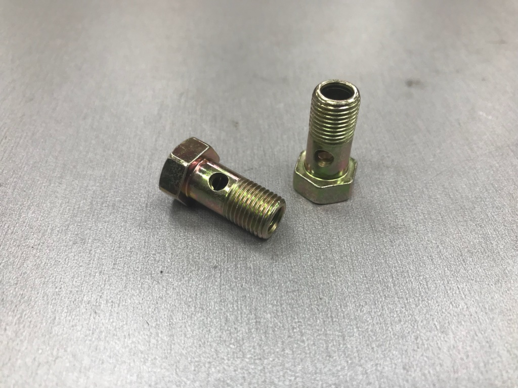 Болт обратки штуцерный ТНВД М10х20х1,5 HOWO, SHAANXI