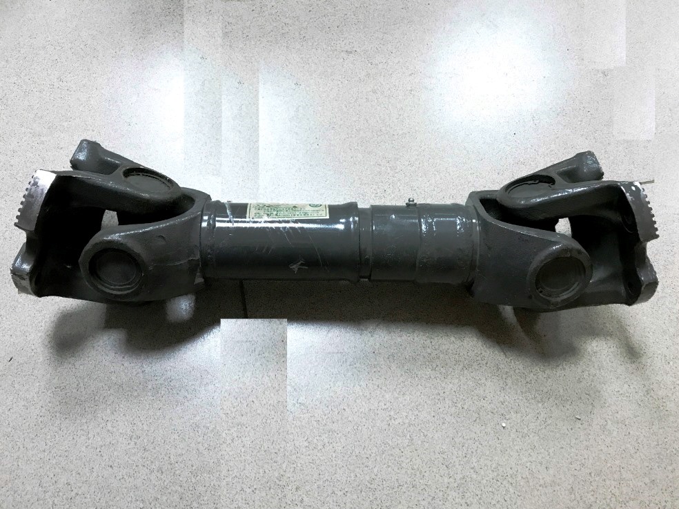 Вал карданный SHAANXI, DongFeng межосевой L=630, крест 57 4 отв. 180 мм