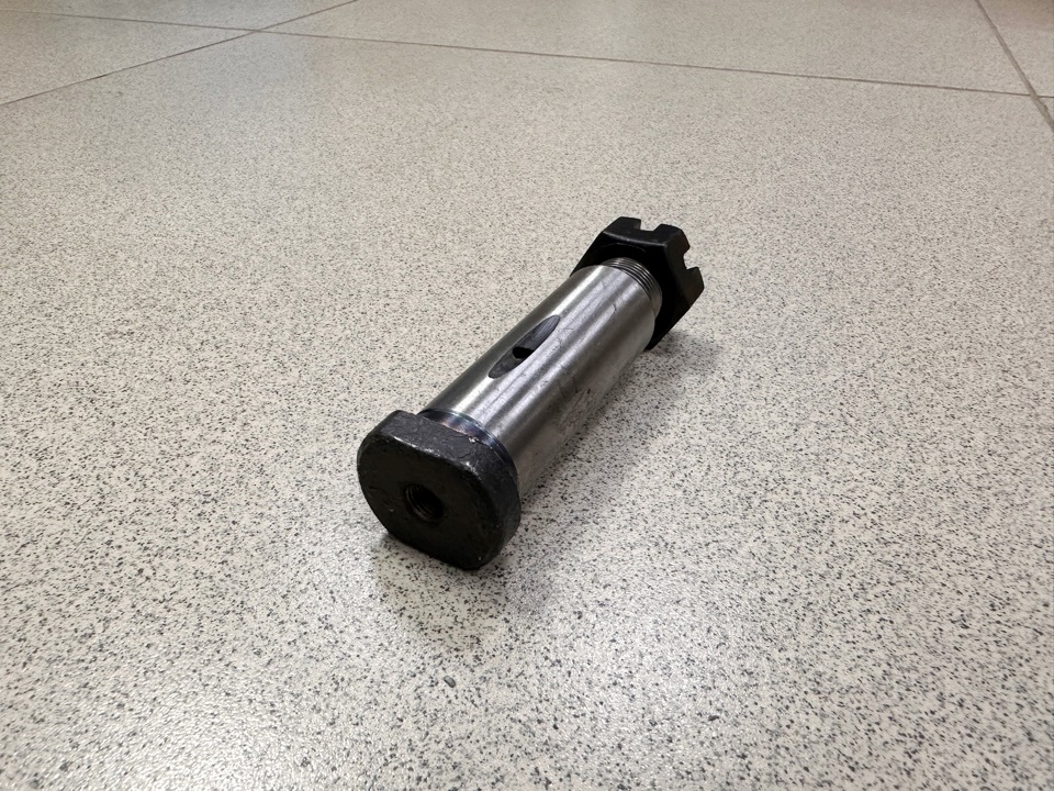 Палец колодки тормозной с гайкой