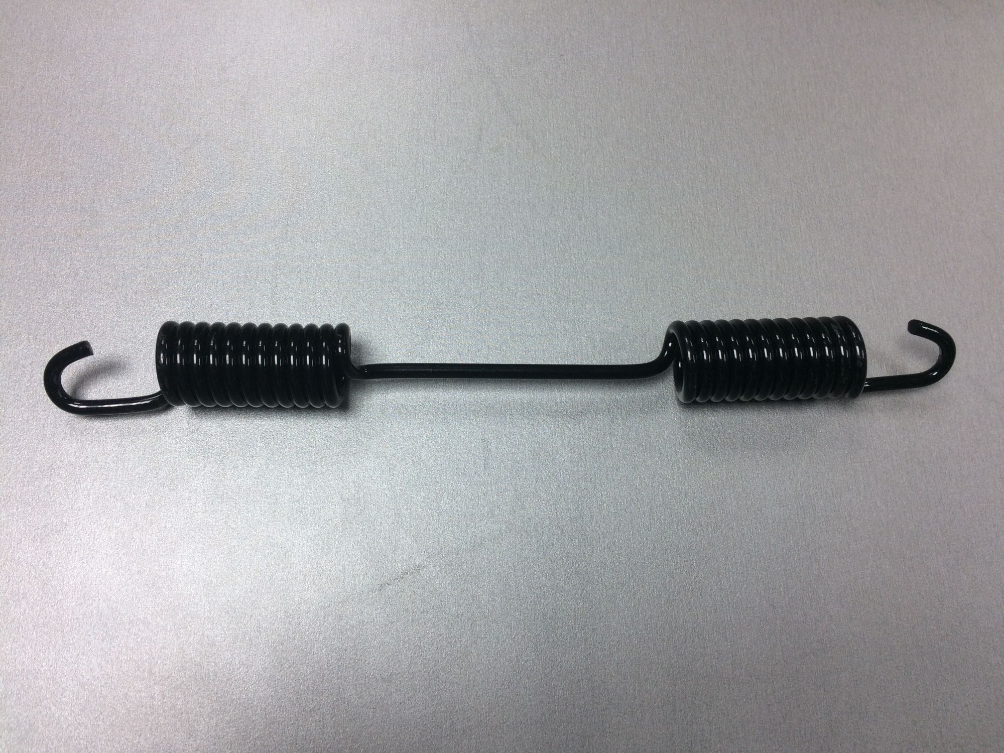 Пружина тормозных колодок L=255 цельная SHAANXI F3000