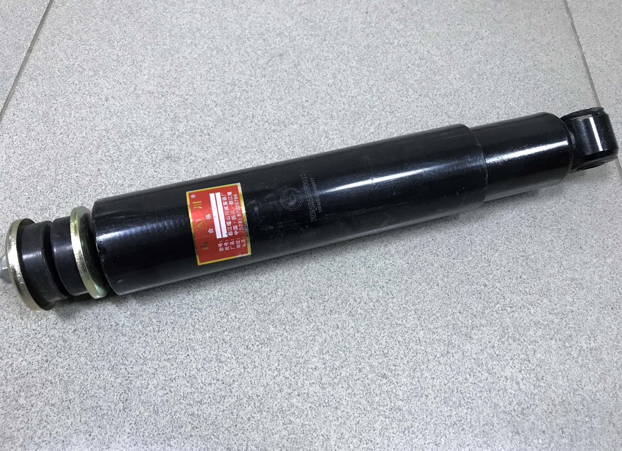 Амортизатор передний SHAANXI (ухо/шток)