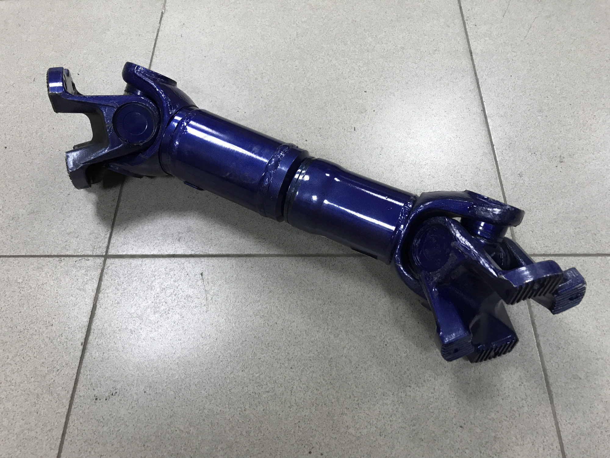 Вал карданный SHAANXI межосевой L=720, крест 57 4 отв.